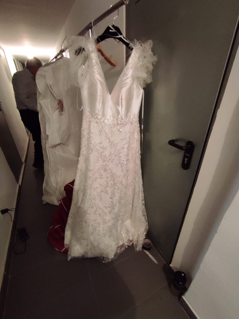 SUB-2026-031 · LOTE 2: EXISTENCIAS TEXTILES ROPA BODAS Y EVENTOS